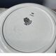 Round, shallow ceramic salad bowl from Saint Amand
