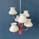 Mid-century opaline glass chandelier with a pink structure.