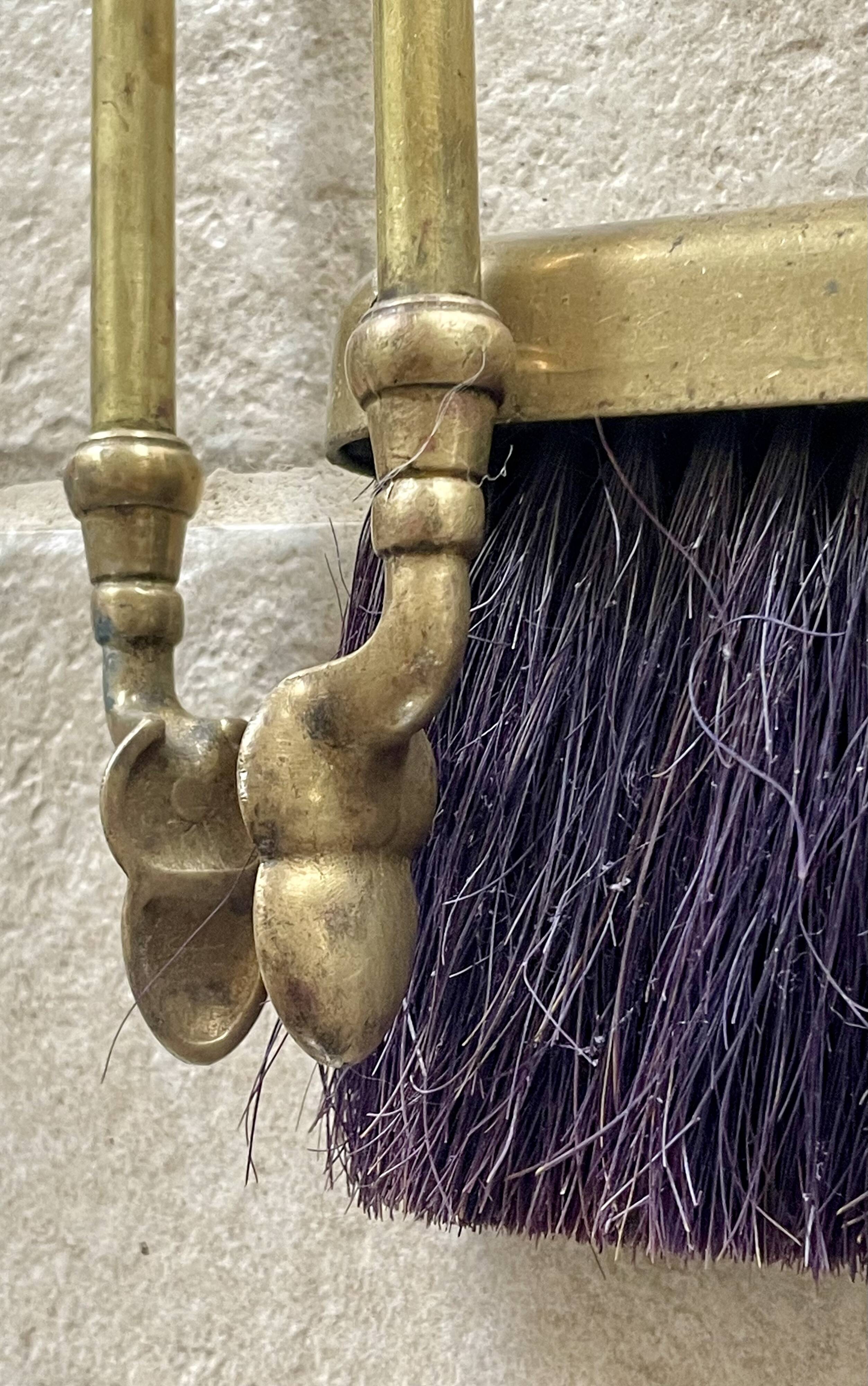 Brass fireplace accessory set with vintage stand