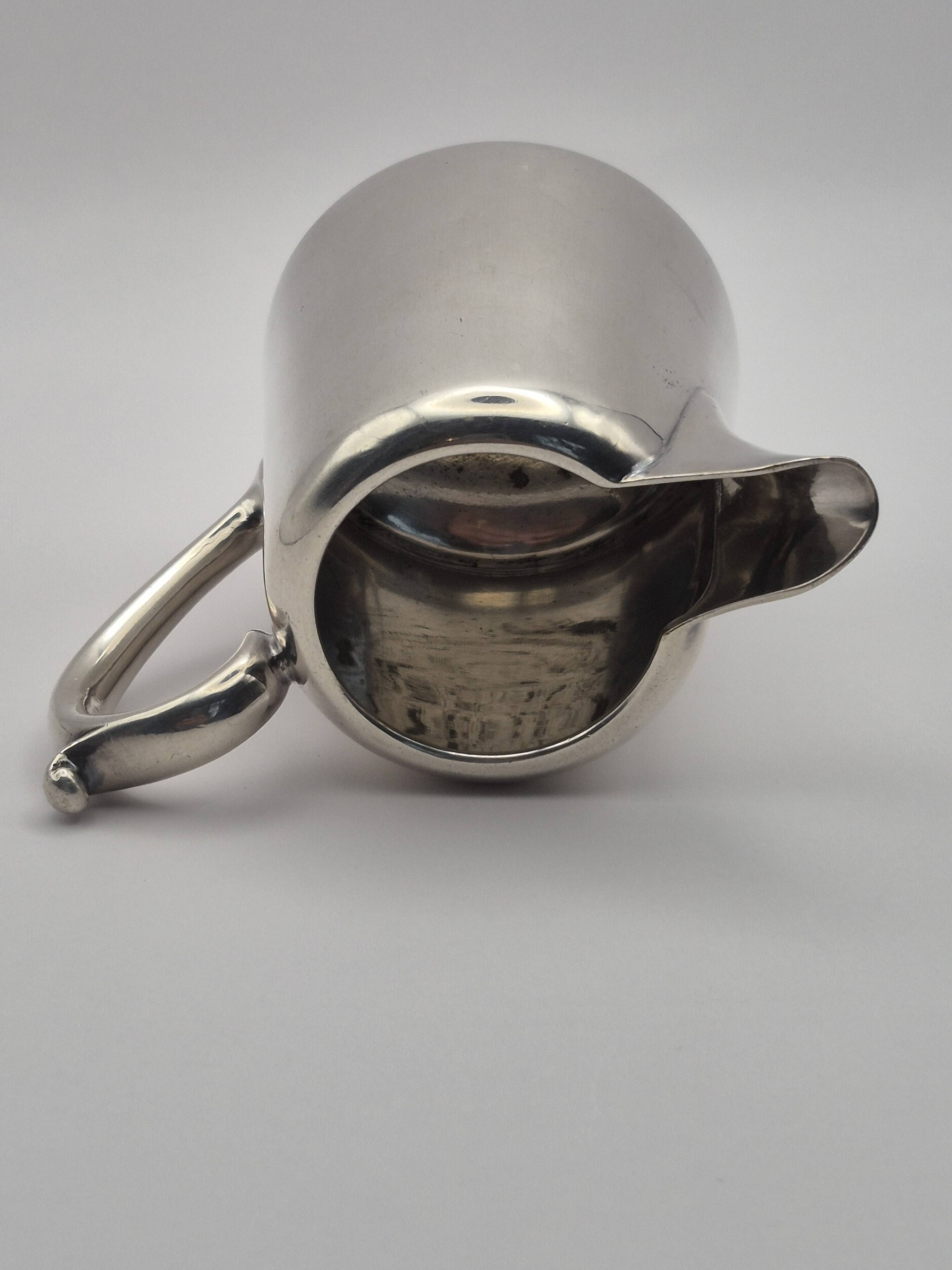 Superb vintage cream jug from the prestigious silversmithing house.