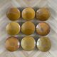 Set of 9 mustard earthenware plates.