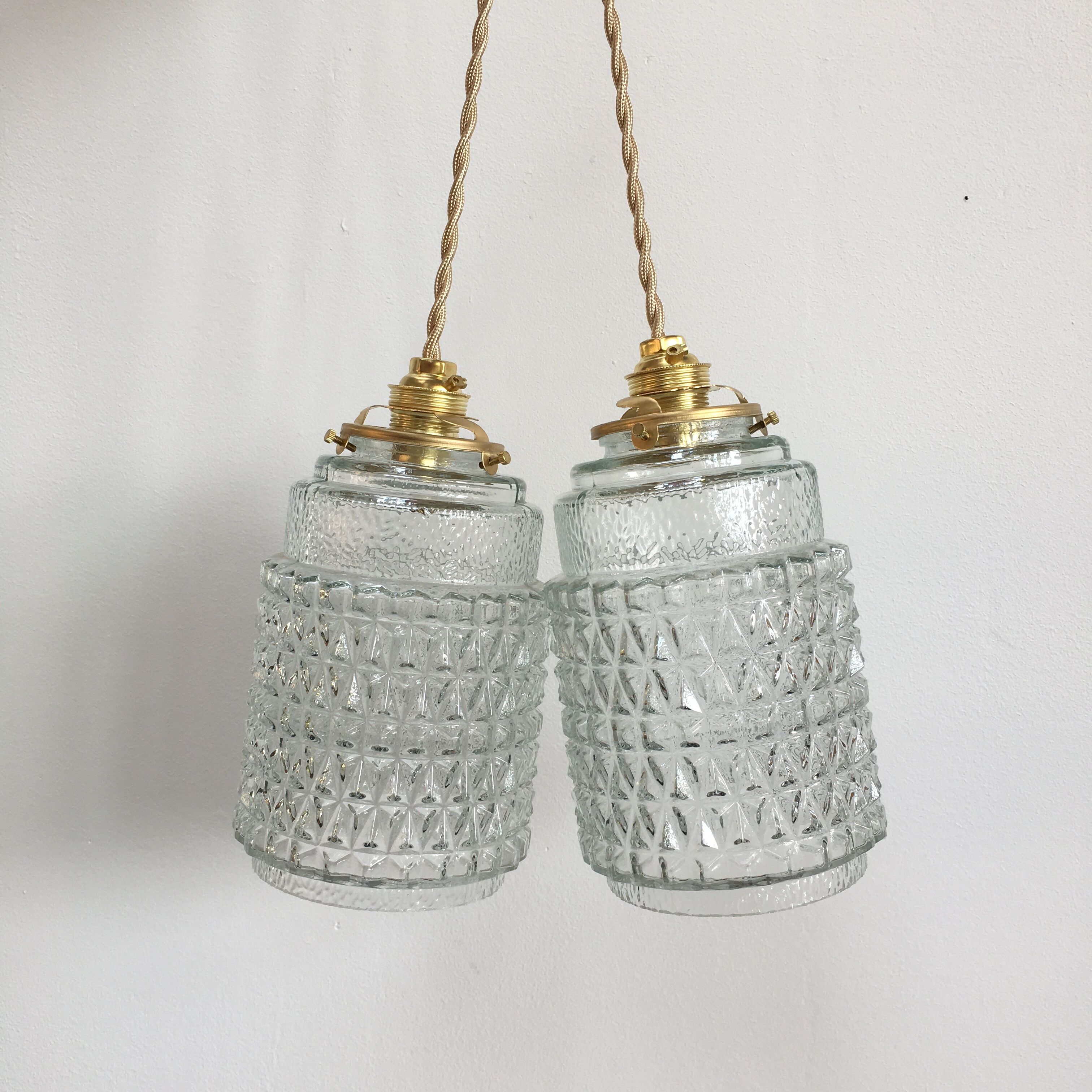 Pair of vintage molded pressed glass pendant lights