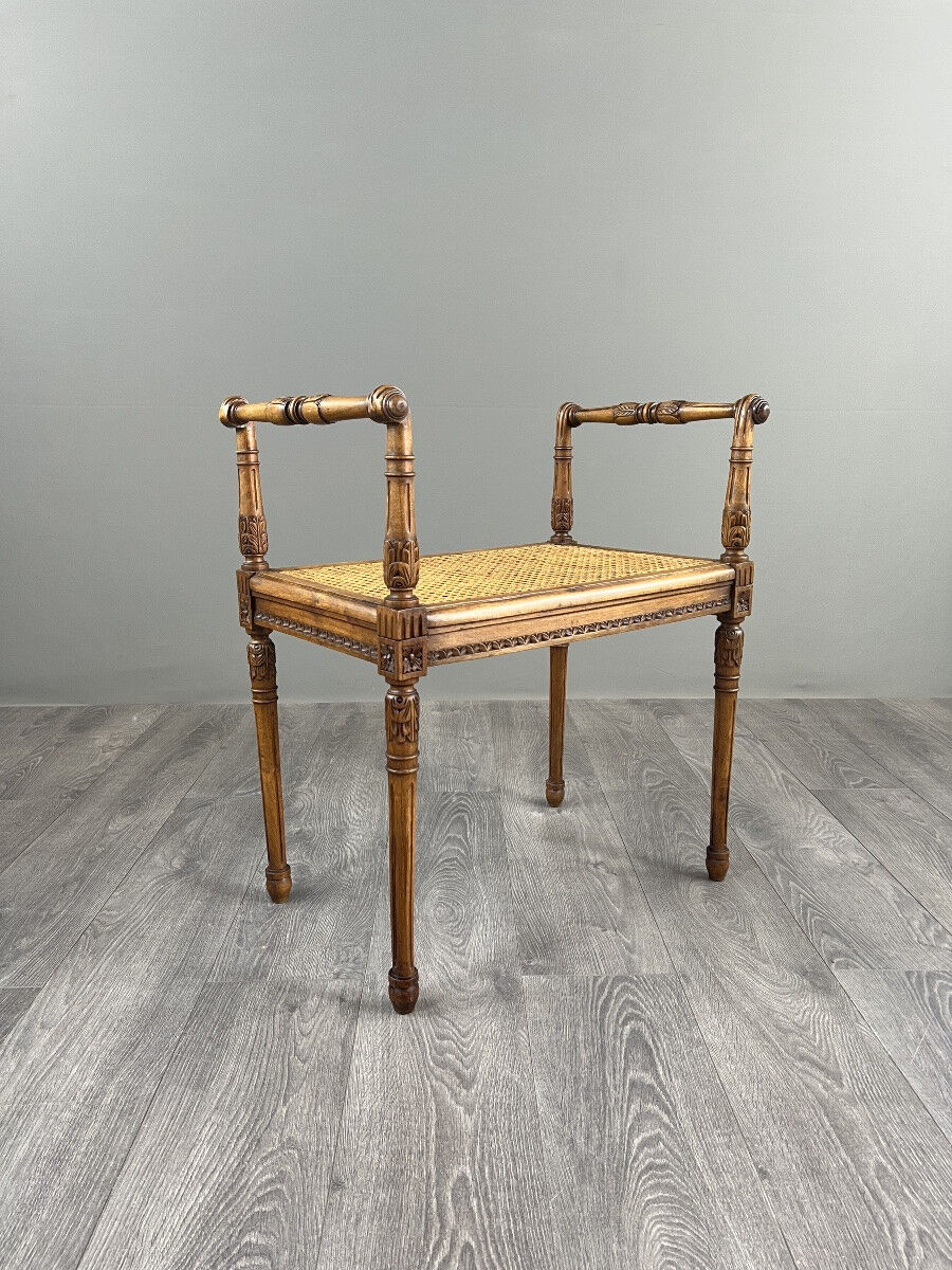 Banquette / tabouret en bois sculpté et cannage, XXe siècle