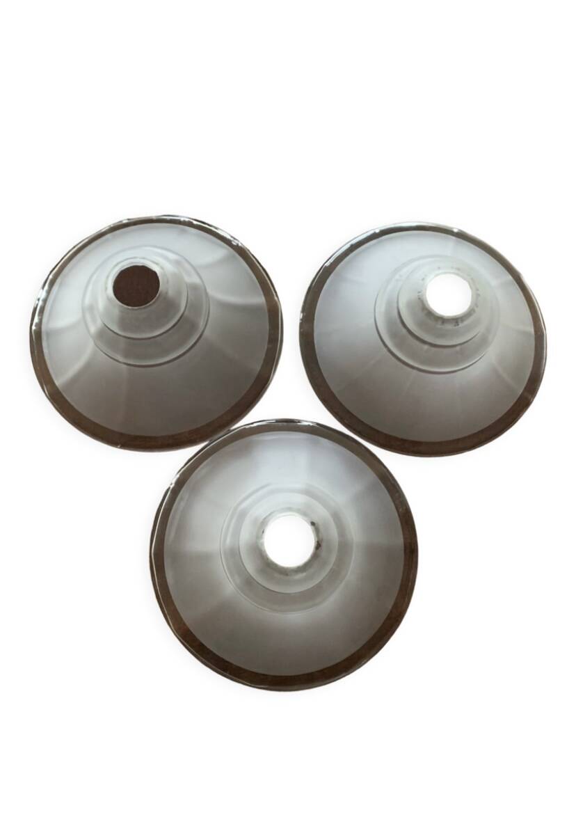 Three glass lampshades