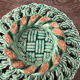 Woven ceramic basket