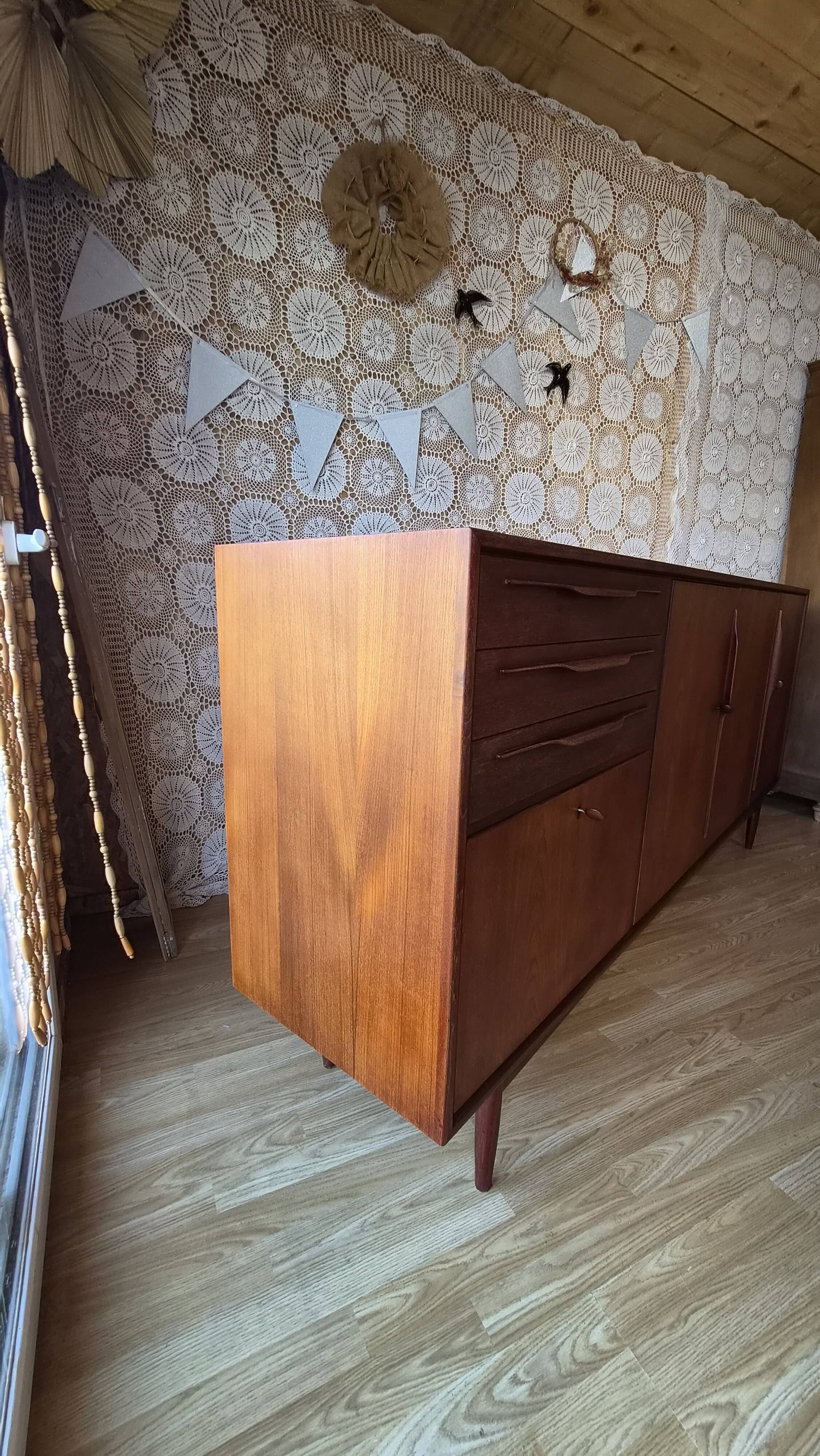 Scandinavian threading Swiss teak model 6002 dated 1961.