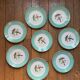 Set of 8 flat plates from the 50s-60s, turquoise rim and bird pattern.