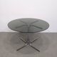 70s round table with smoked glass and chrome