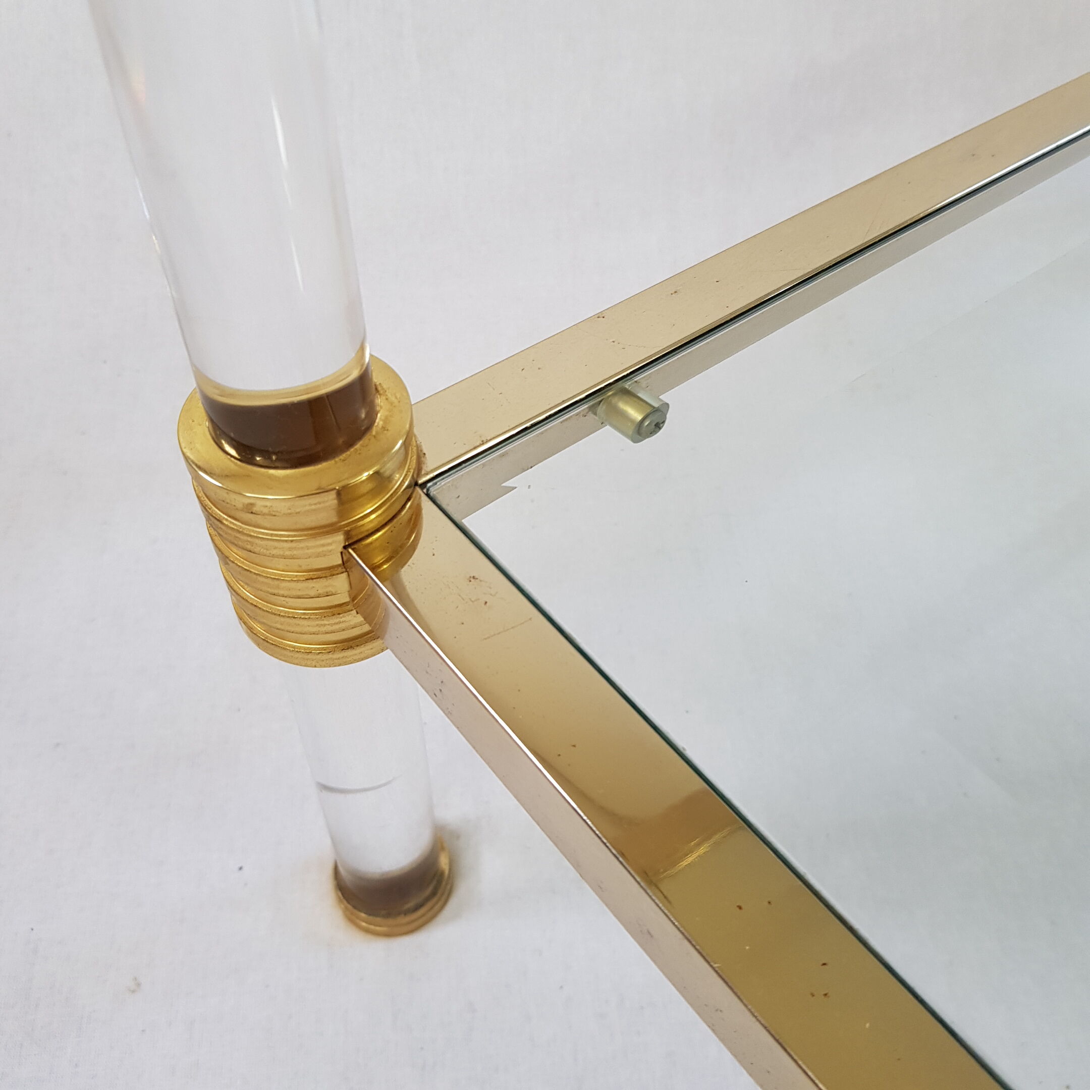 Coffee table in Lucite and Golden steel