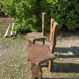 2 solid wood Johnny Ludecher folk art chairs