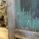 Old glazed wooden door patinated