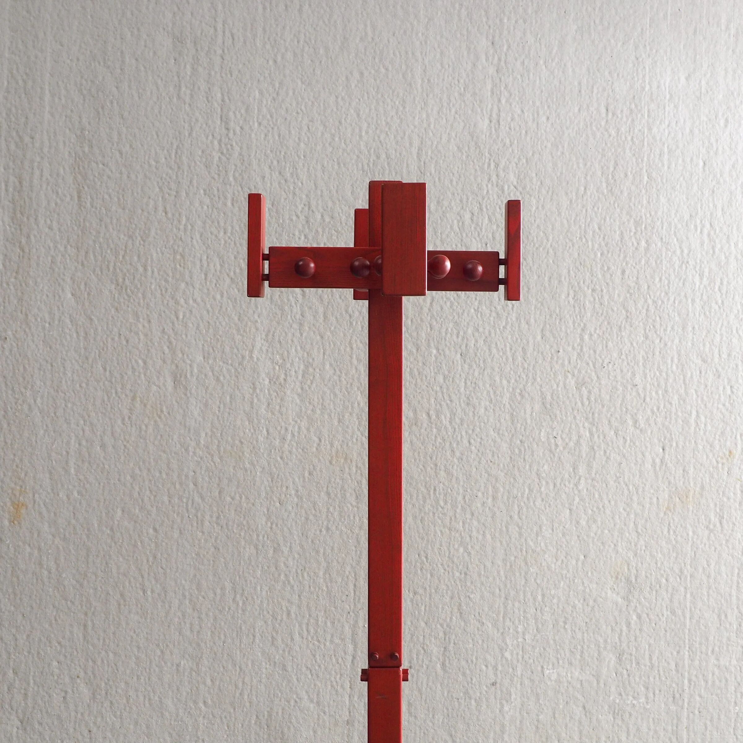 Postmodern red stained pine wood coat hanger
