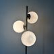 Cluster floor lamp with 3 spherical lamps in gold metal and white glass