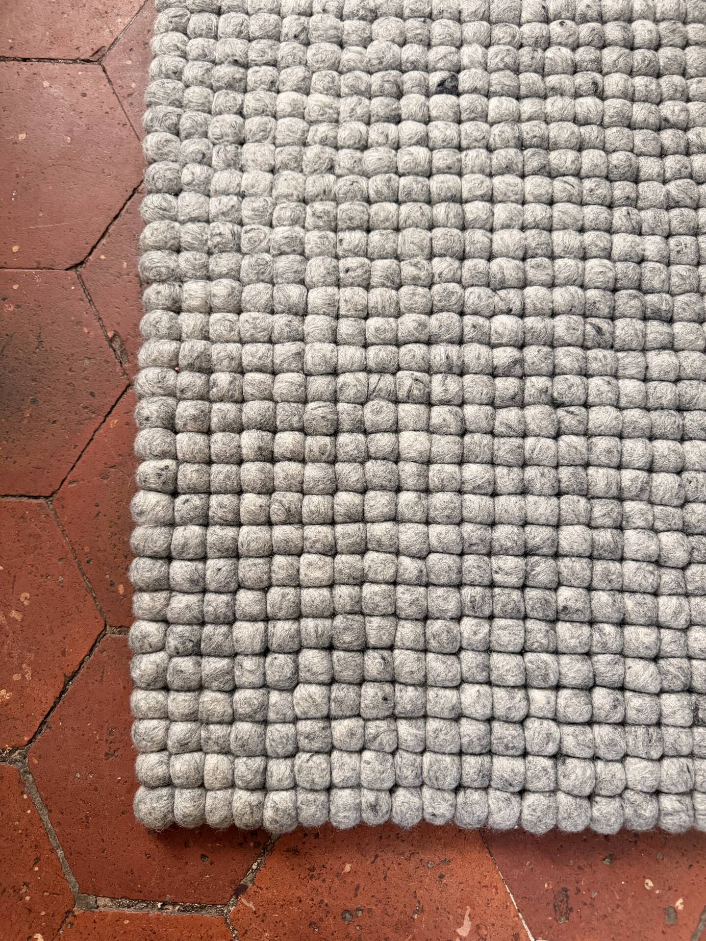 Myfelt rug made of virgin wool felt balls.