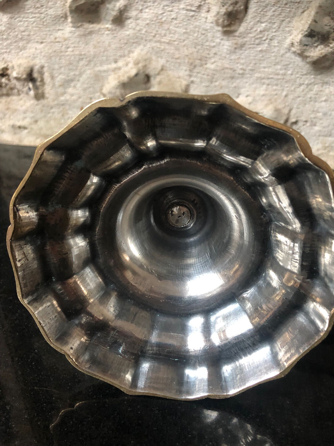 Antique candle holder in silvered bronze