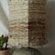 Vintage ceramic lamp with a wool shade.