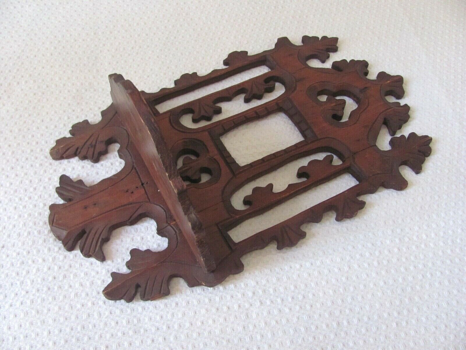 Shelf to hang in carved wood, early 20th century