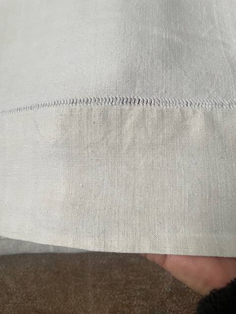 Antique linen sheet with monogram VI