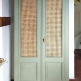 Caned cabinet with oranges