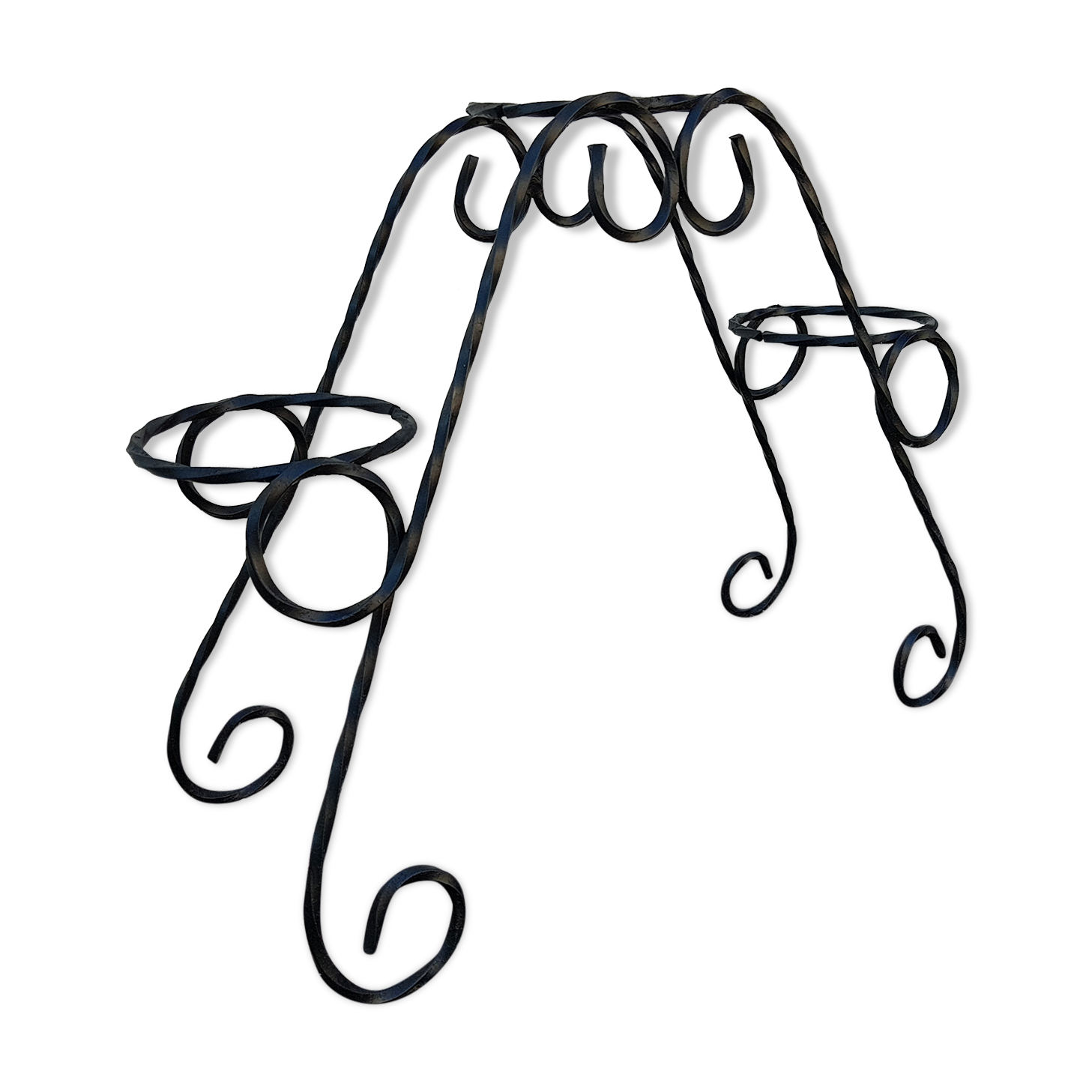 Black wrought iron plant holder