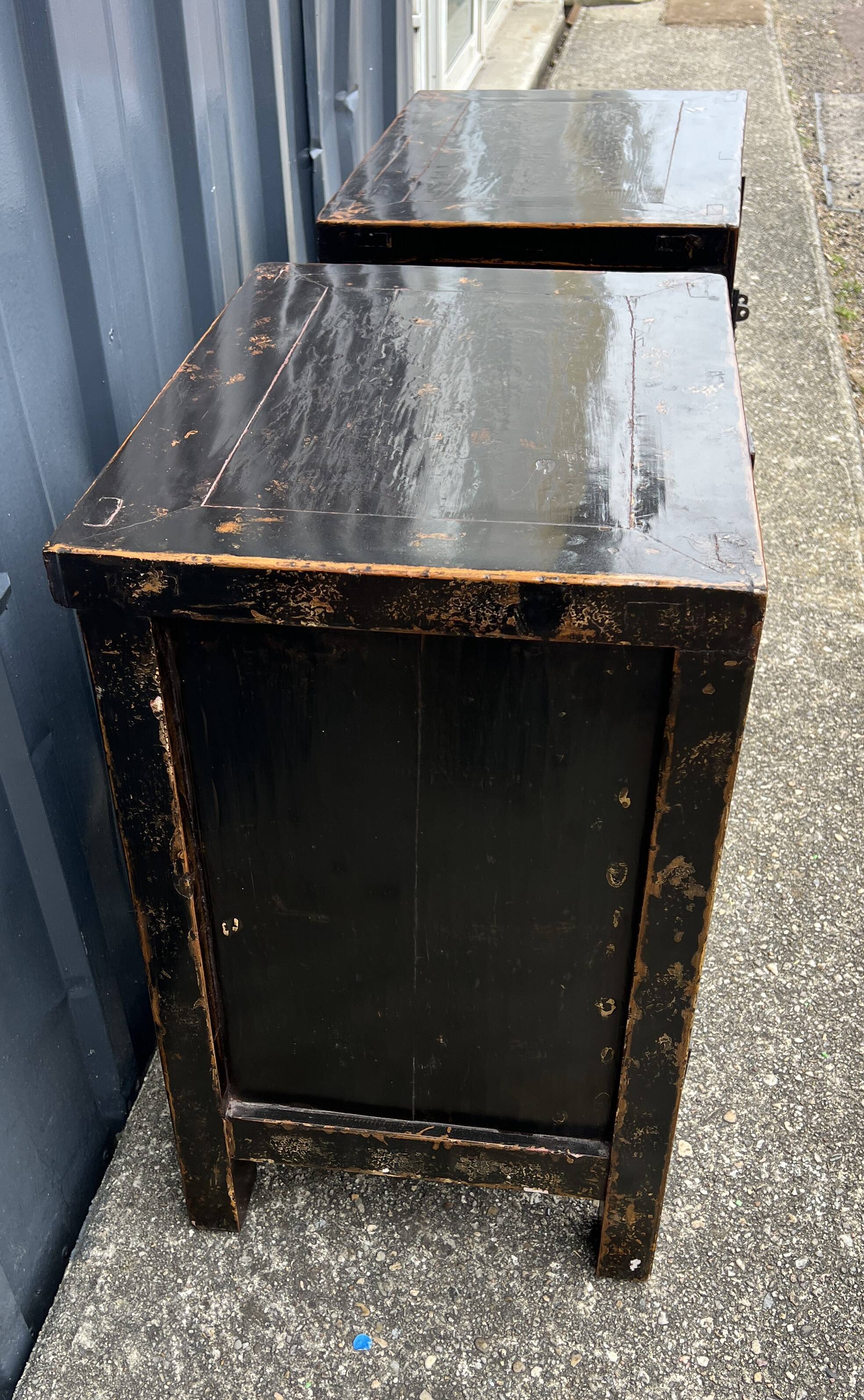 Pair of small occasional or sofa end pieces, lacquered in Asian black