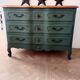 Commode arbalete patine vert foncé
