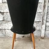 Pair of Baumann model Essor chairs in faux black leather, beech compass footing