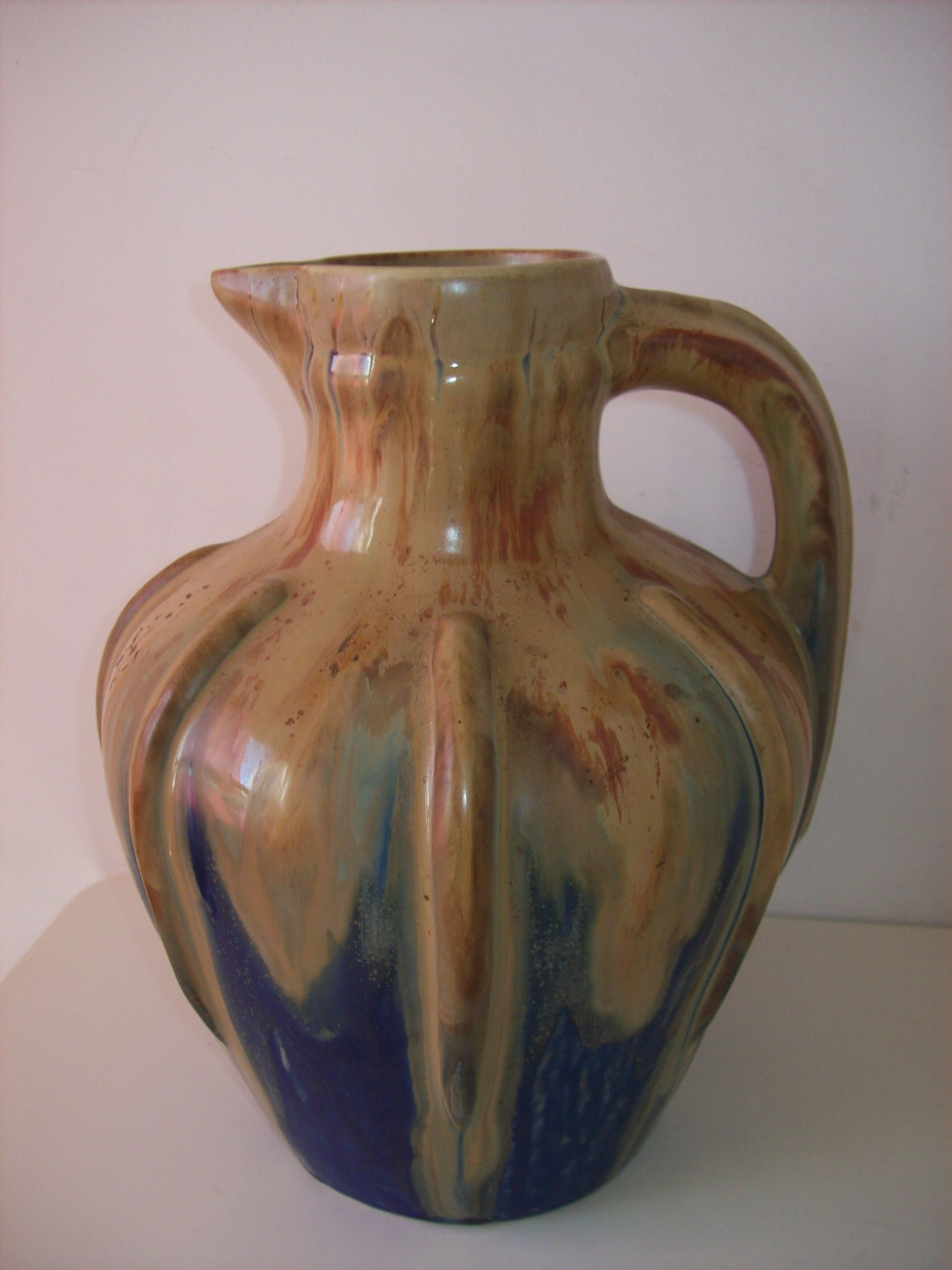 Large Art Deco ceramic pitcher by Méténier