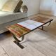 Ceramic coffee table and brushed steel by Jean Gregorieff