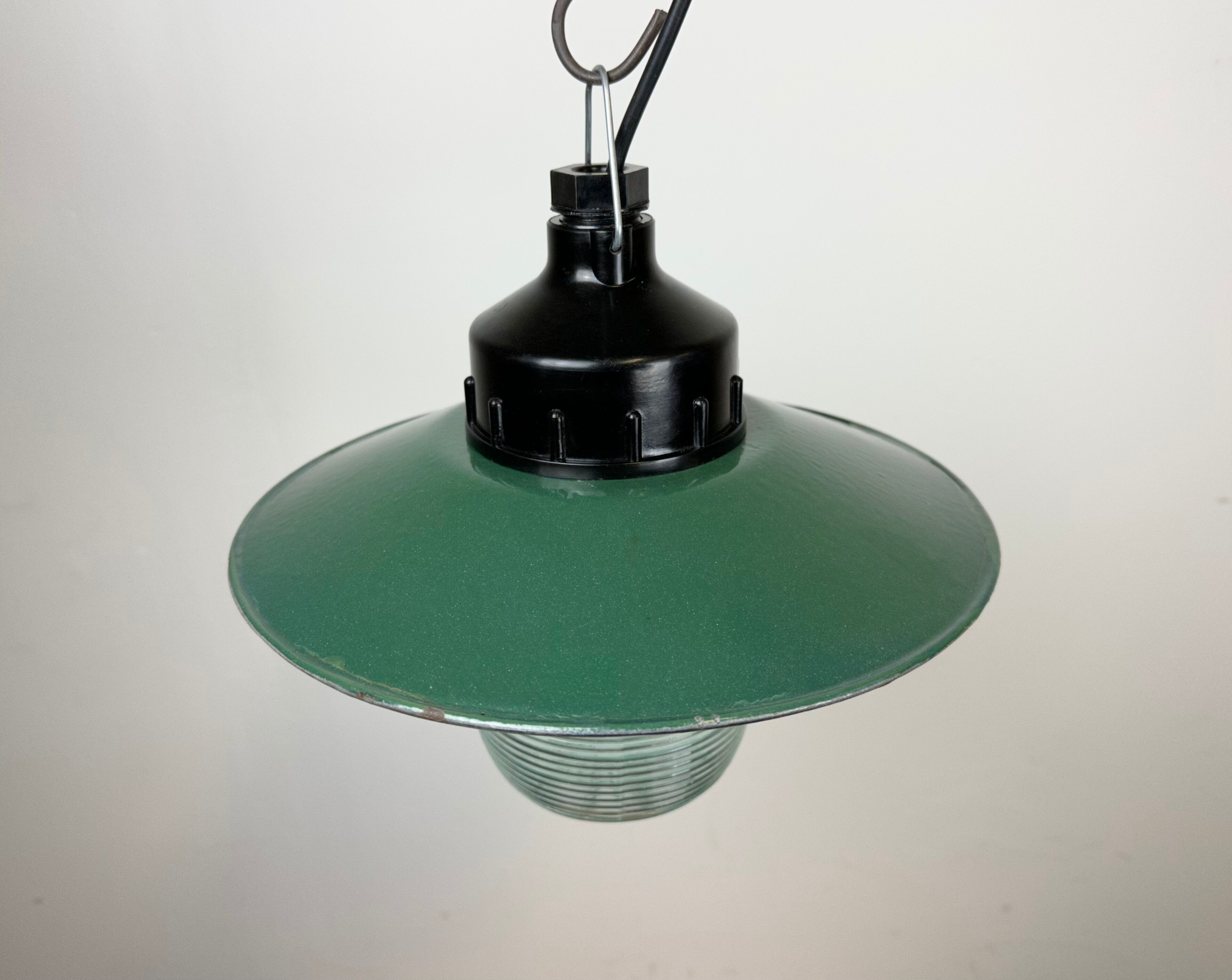 Industrial bakelite green enamel pendant light with ribbed glass, 1970s