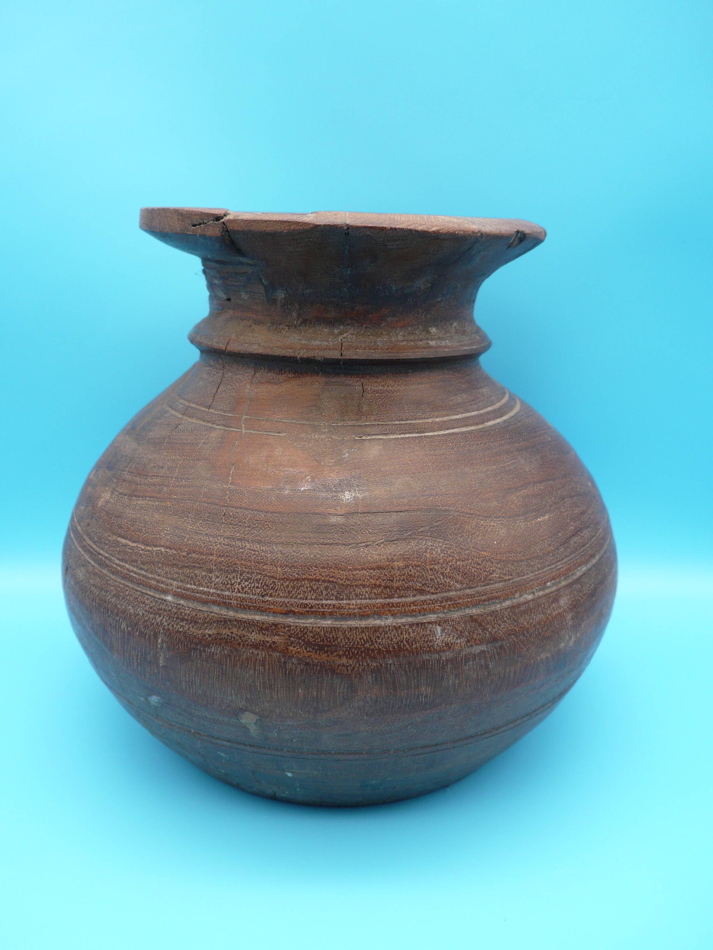 Large carved wooden pot / India