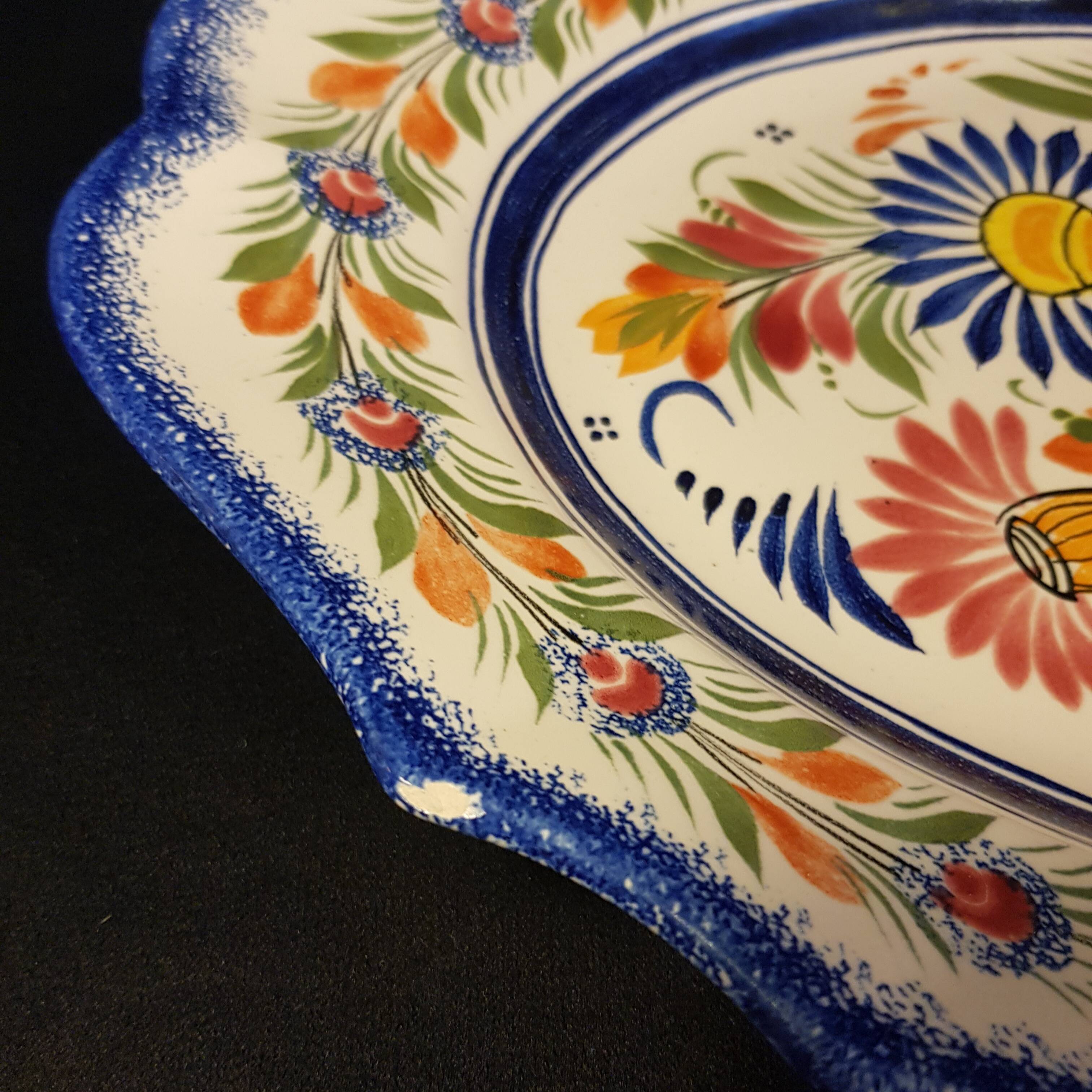 Vegetable soup tureen on Henriot Quimper display dish