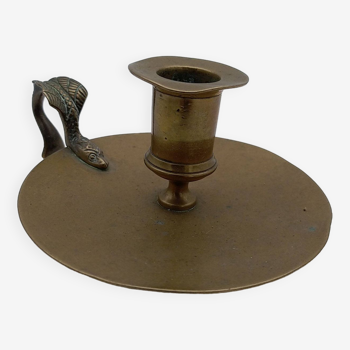 Brass candlestick with chimera decoration