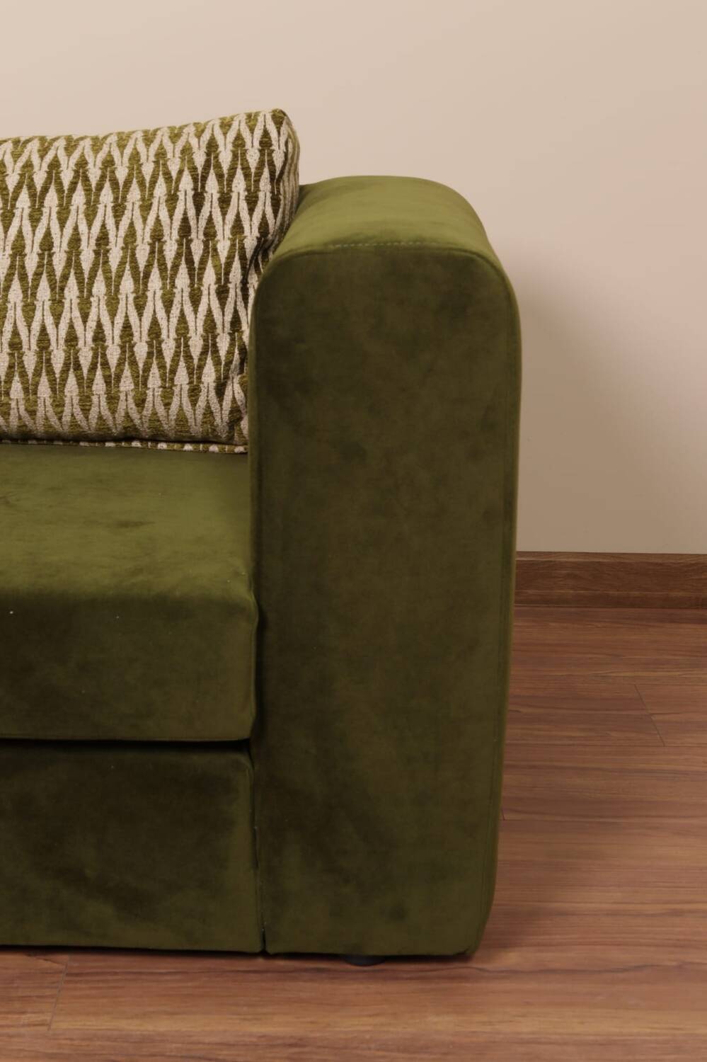 Olive velvet two-seater sofa