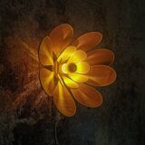 Flower wall light made of rattan and saffron linen petals