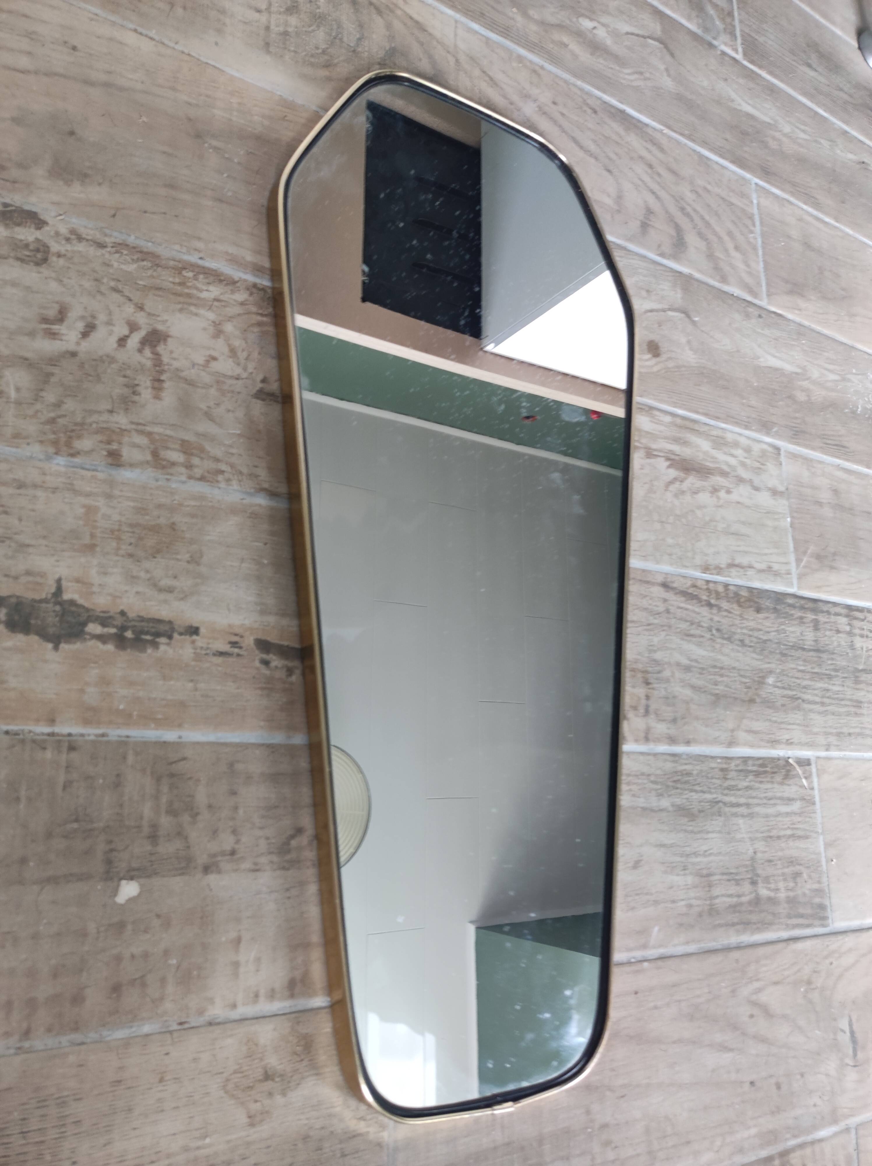 Asymmetrical mirror free-form rearview mirror