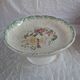 Ceramic compote with floral decoration