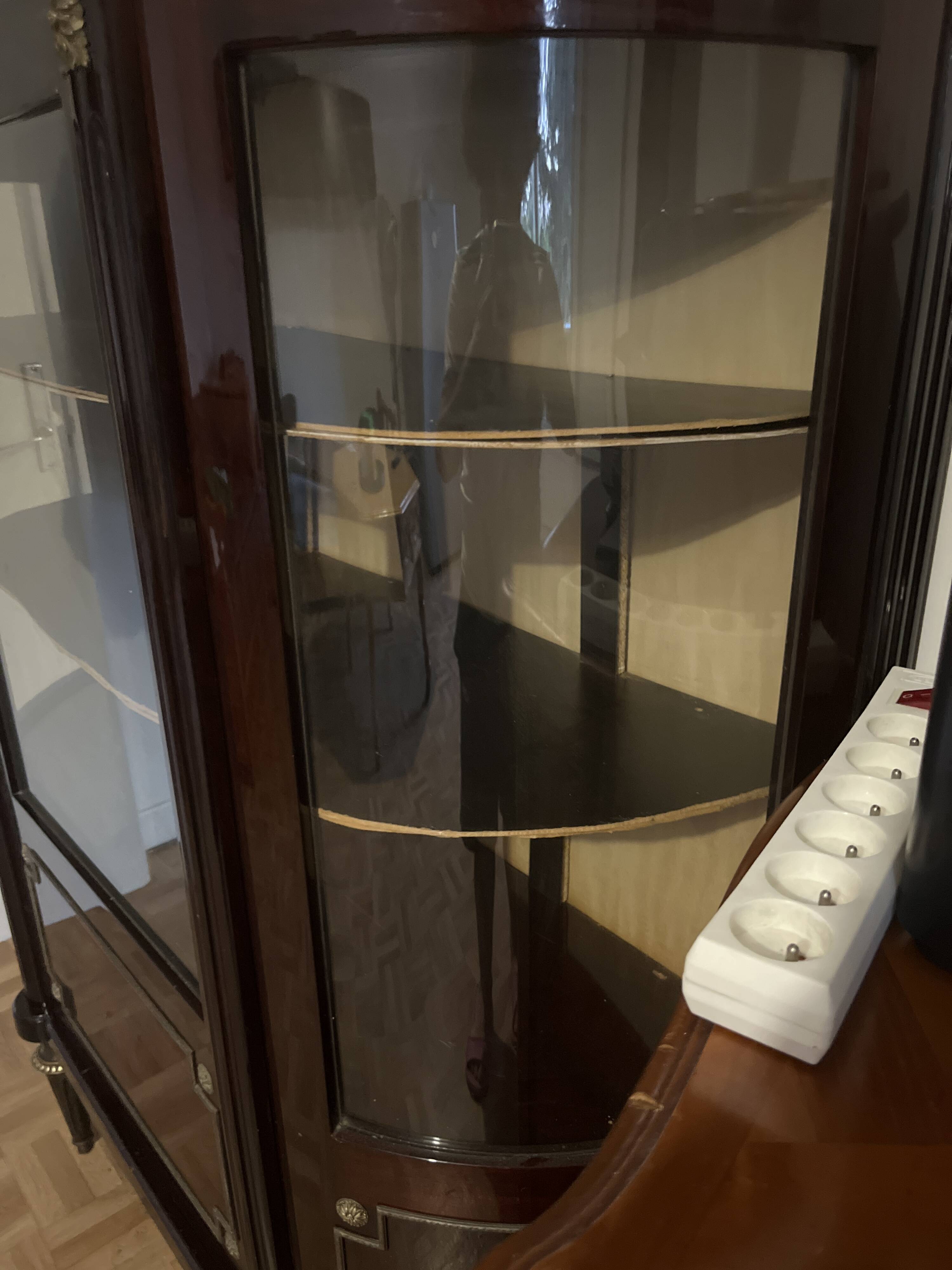 Curved display cabinet in Louis XVI style