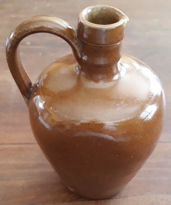 Small pitcher sandstone - 60s/70s - " Federal law forbids dirty. Or reuse of this bottles "
