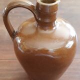 Small pitcher sandstone - 60s/70s - " Federal law forbids dirty. Or reuse of this bottles "