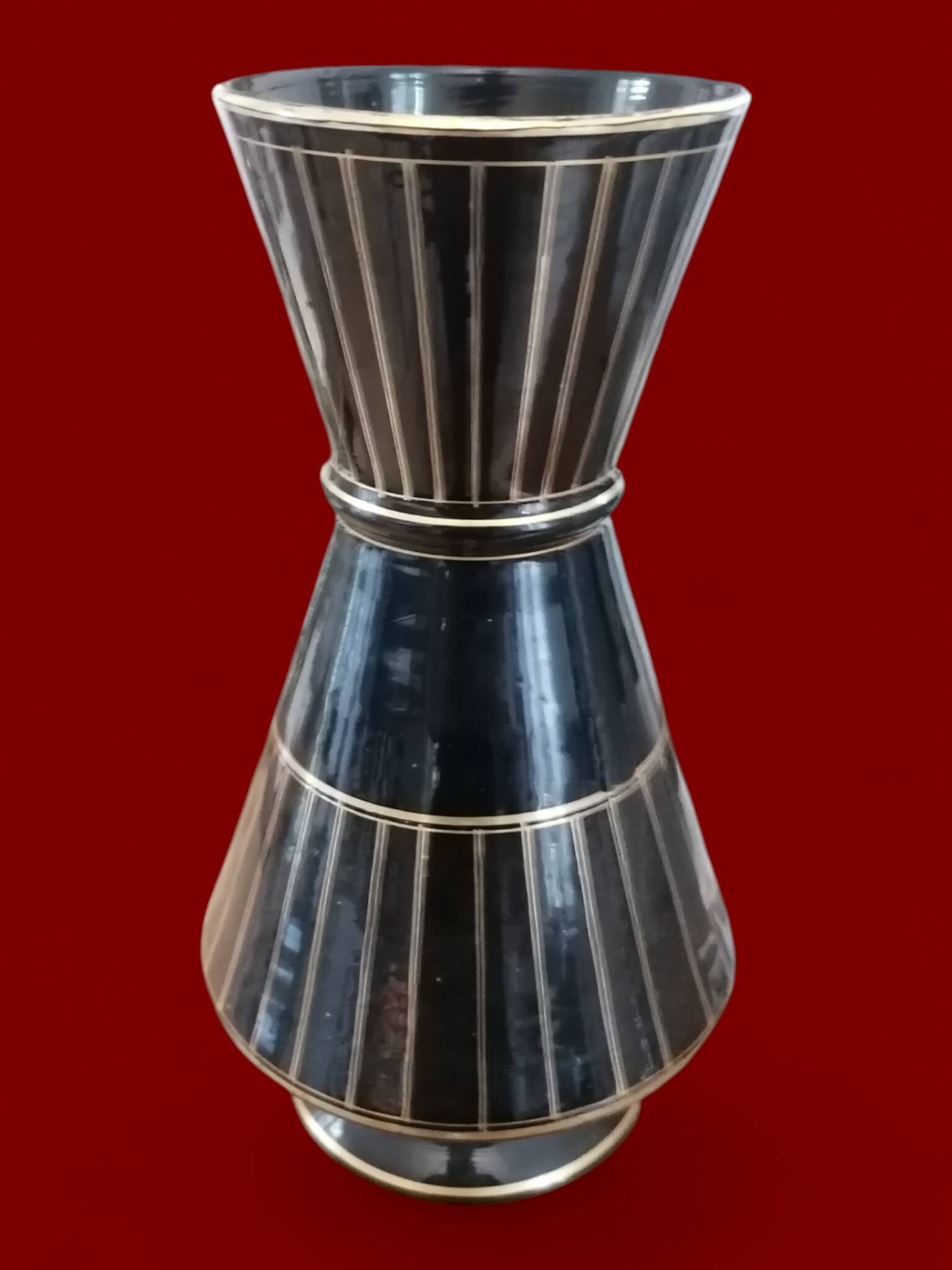 Antique black enameled glass vase