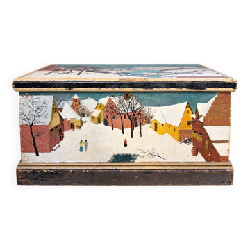 Antique chest hand-painted with a snowy village scene and a starry interior.