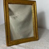 Miroir vintage en bois à poser ou à suspendre de couleur dorée