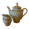 Teapot and milk jug in Limoges porcelain.