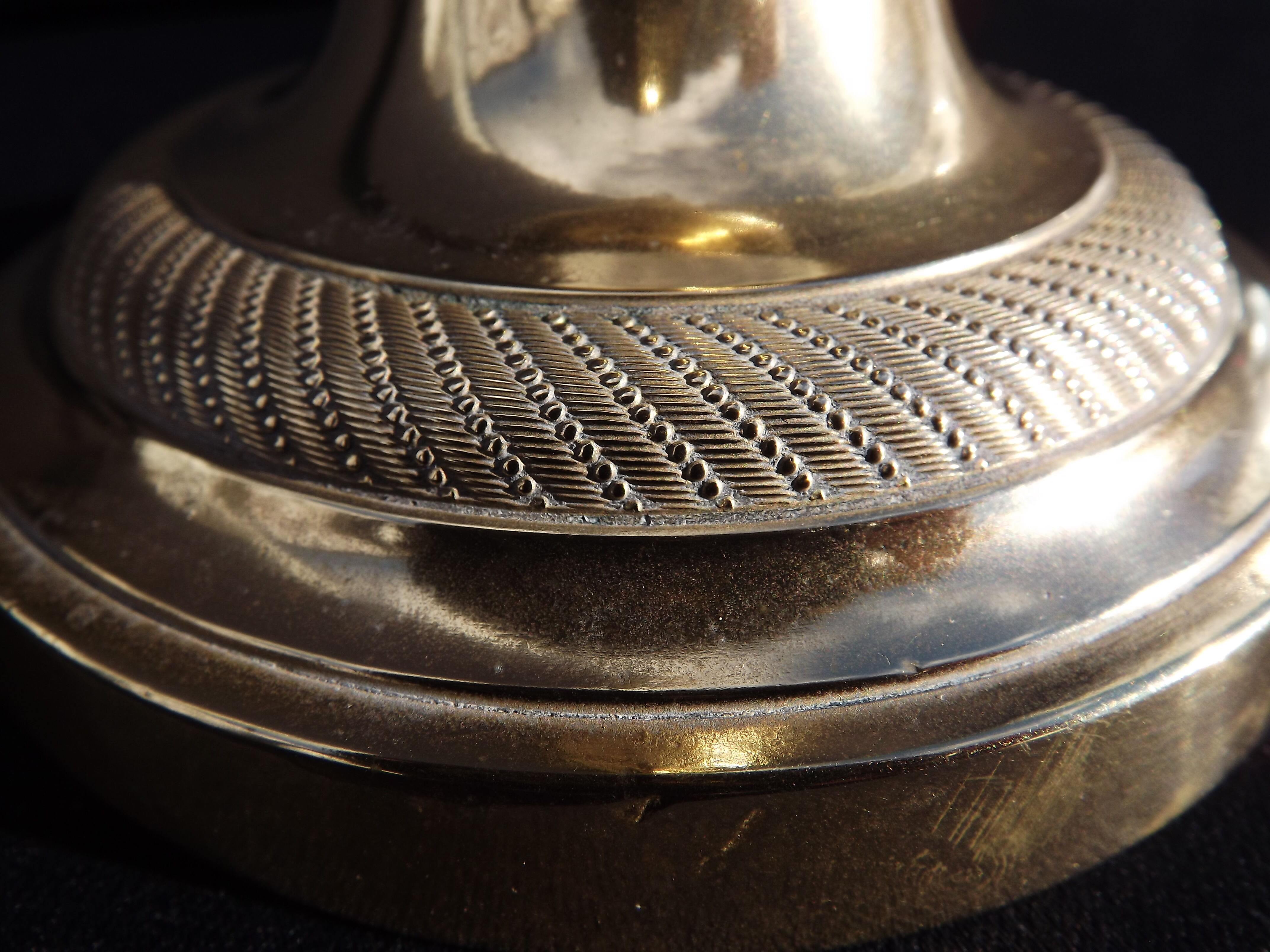 Candlestick period "restoration" in bronze