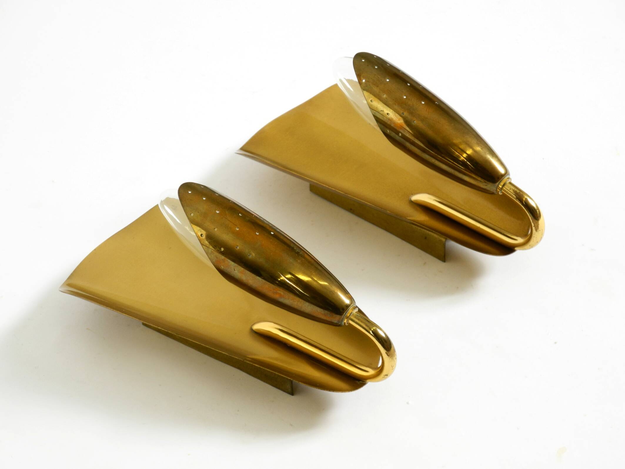 Two enchanting original Swedish Mid Century Modern brass wall lamps