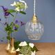 Suspension globe vintage en verre moulé transparent