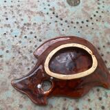 Empty pocket in glazed ceramic slip in the shape of vintage fish
