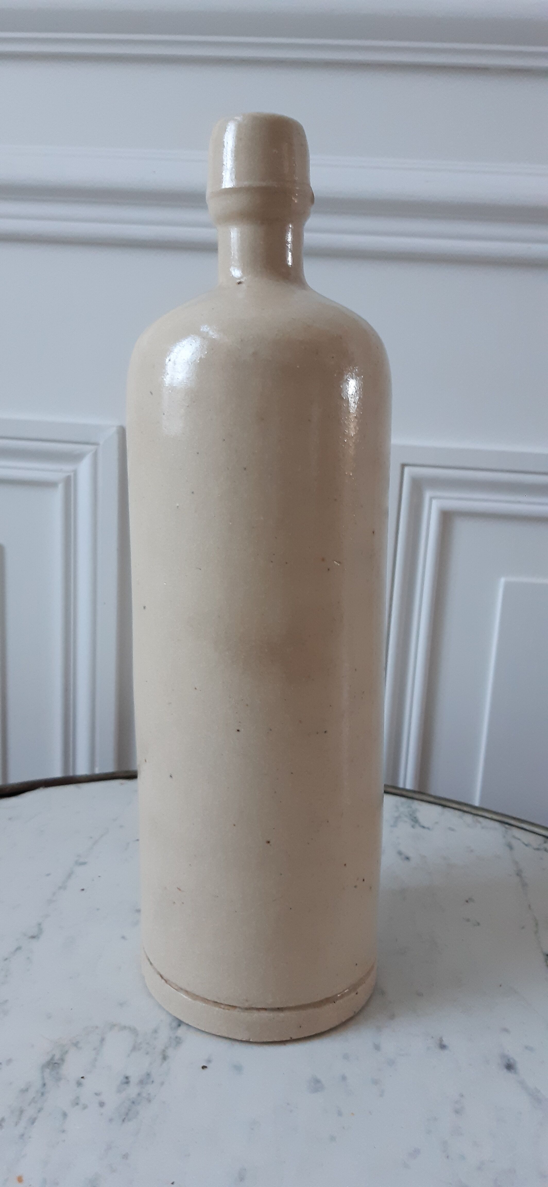 Bottle in ancient artisanal sandstone