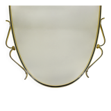 Elegant wall mirror in brass and black from the mid-century, Italy, 1950s.